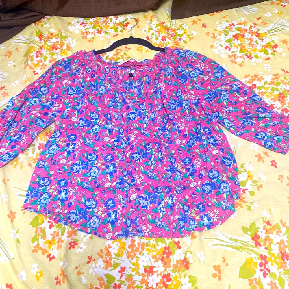 This blouse can fit a small also, only worn 3 times
